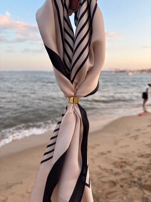 Breton Scarf held at the beach in evening light