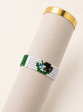Tintabeads Mexico armband met kralen in groen, wit en rood, bestaande uit zes verbonden rijen.